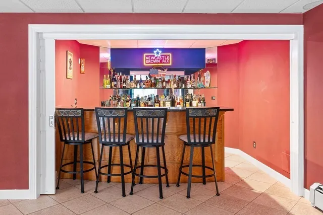 a view of dinning table and chairs in the balcony