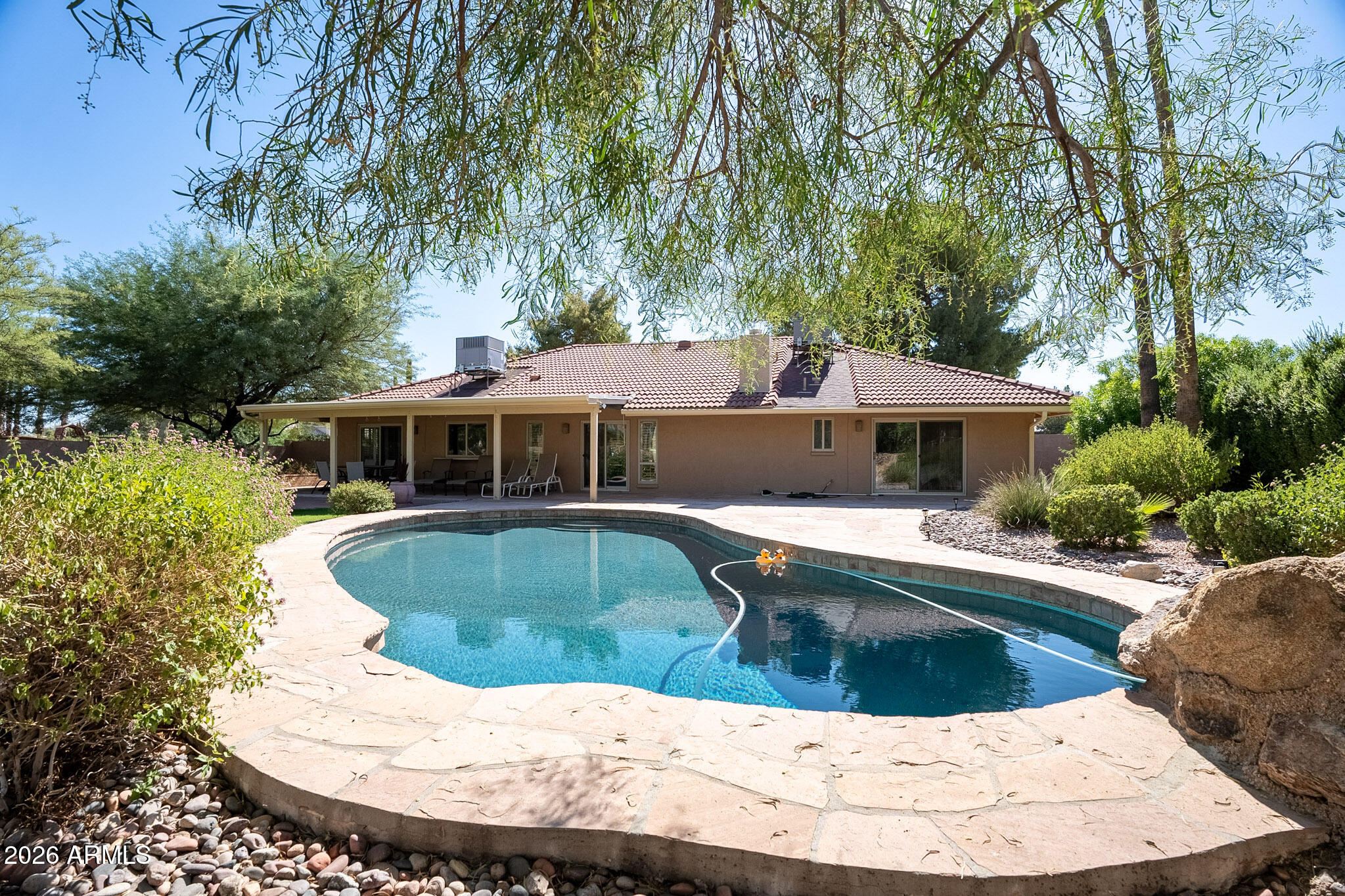 4226 East North Lane Phoenix, AZ 85028 - Photo 42 of 43 a view of house with swimming pool outdoor seating