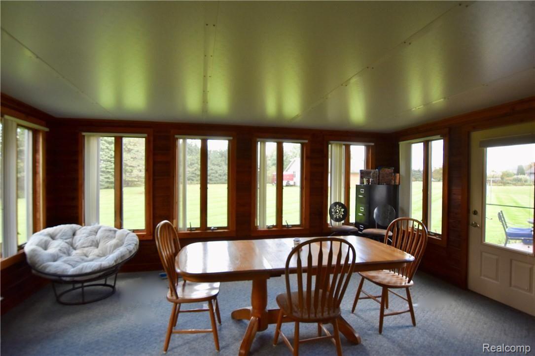 8103 Perry Road Grand Blanc, MI 48439 - Photo 28 of 47 Four seasons room ~ Great for extra space when you need it for family get-togethers