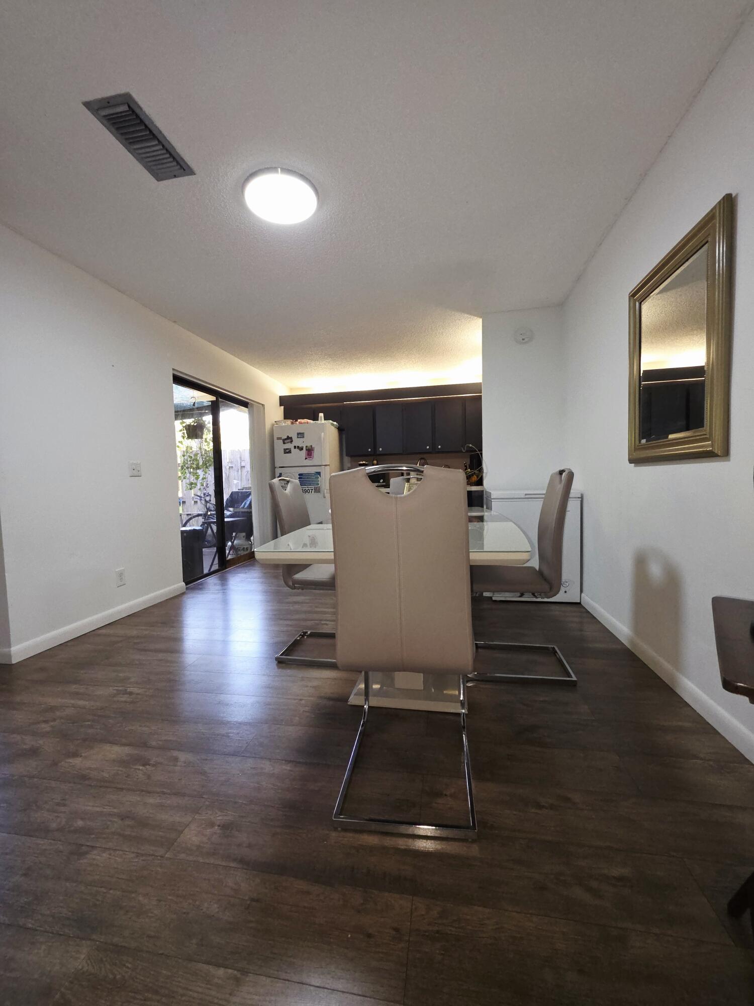 218 Woodland Road Palm Springs, FL 33461 - Photo 11 of 45 a view of a livingroom with furniture and a table