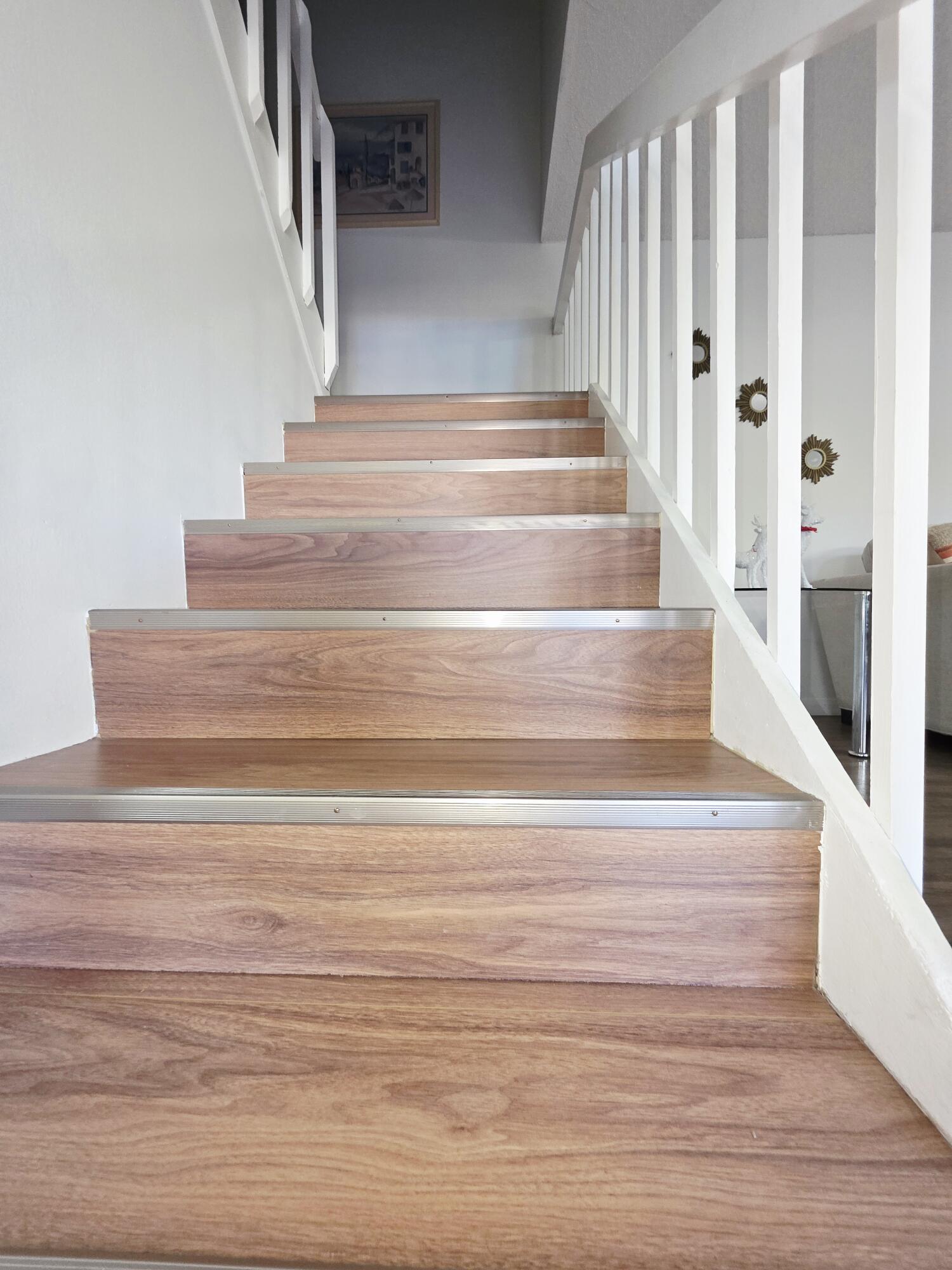 218 Woodland Road Palm Springs, FL 33461 - Photo 12 of 45 a view of staircase with white walls and white walls