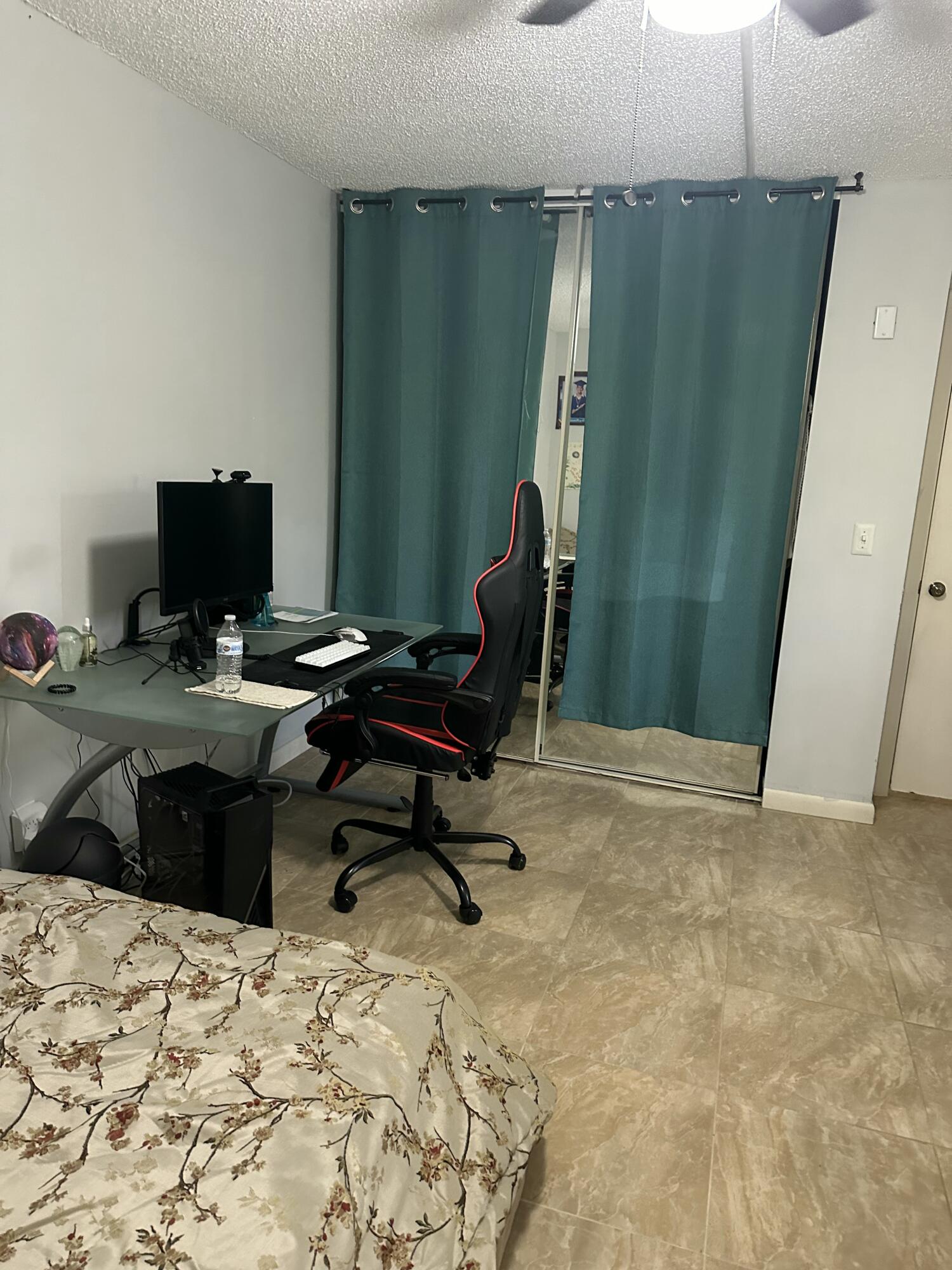 218 Woodland Road Palm Springs, FL 33461 - Photo 31 of 45 a room with a bed and a chair