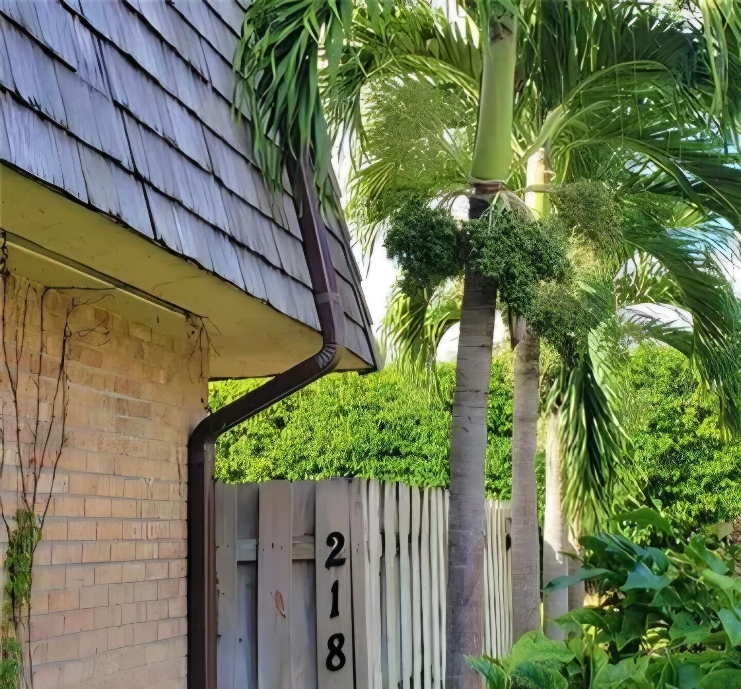 218 Woodland Road Palm Springs, FL 33461 - Photo 34 of 45 a view of a yard in a backyard