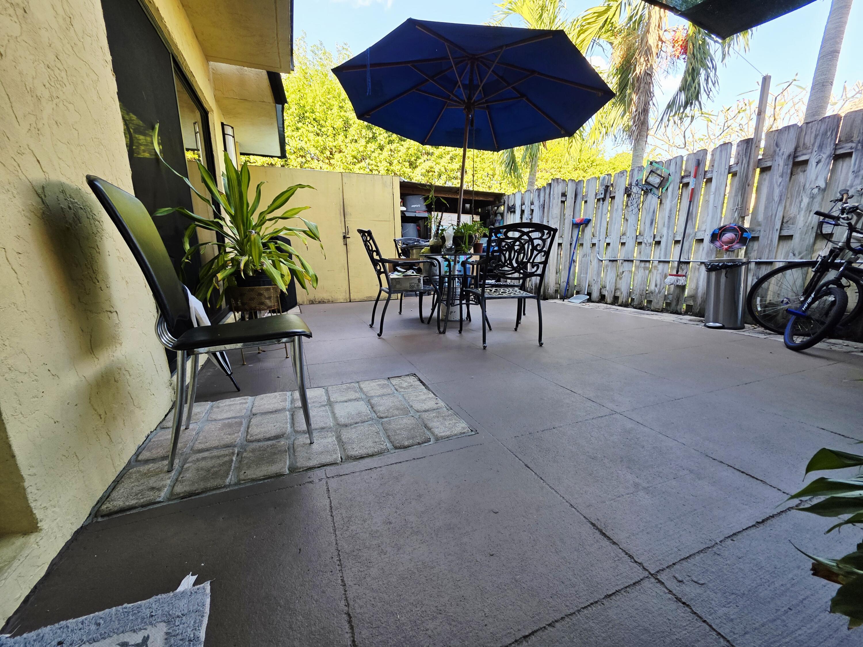 218 Woodland Road Palm Springs, FL 33461 - Photo 38 of 45 a view of outdoor space yard and patio
