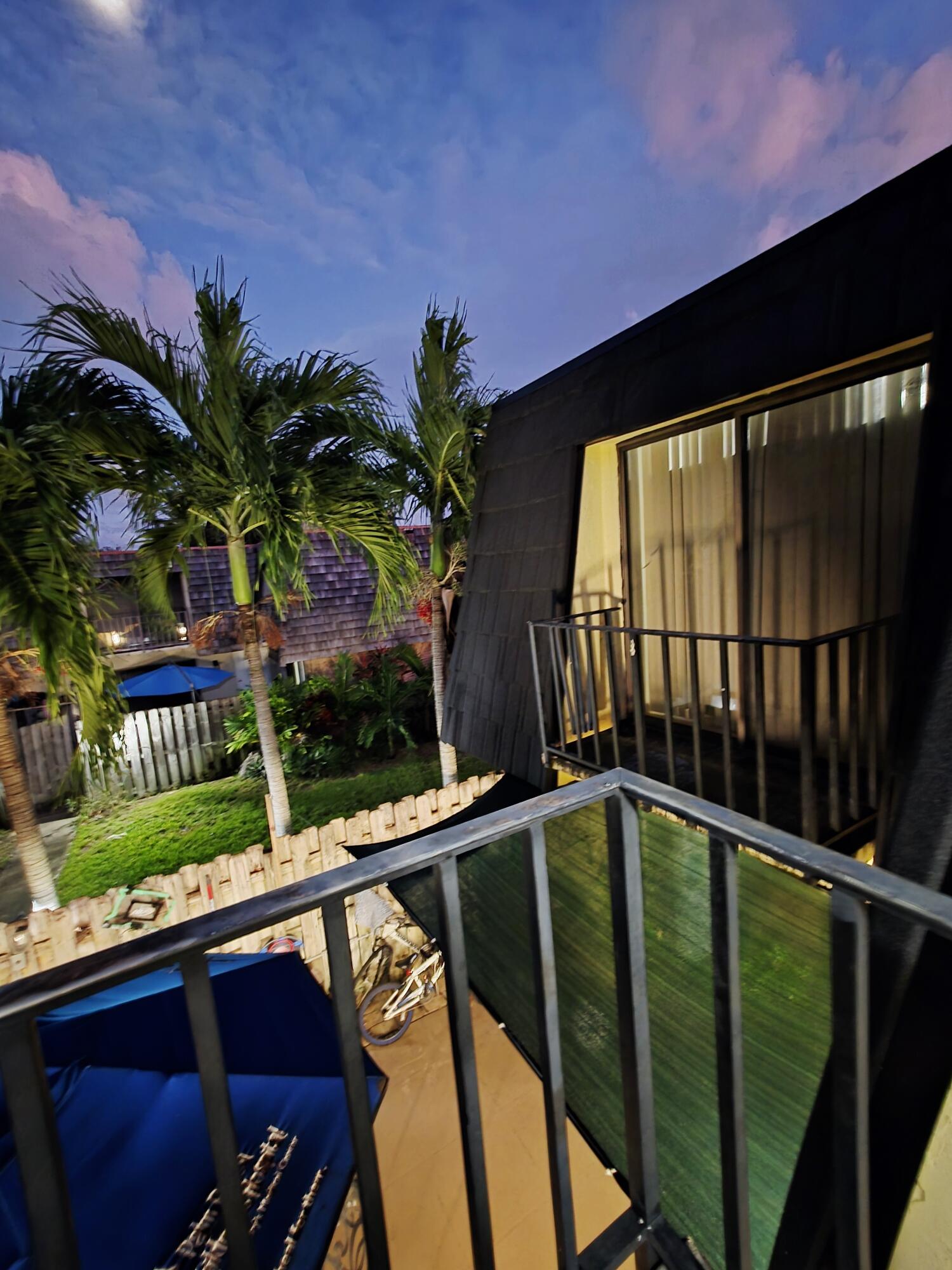 218 Woodland Road Palm Springs, FL 33461 - Photo 41 of 45 a view of a balcony