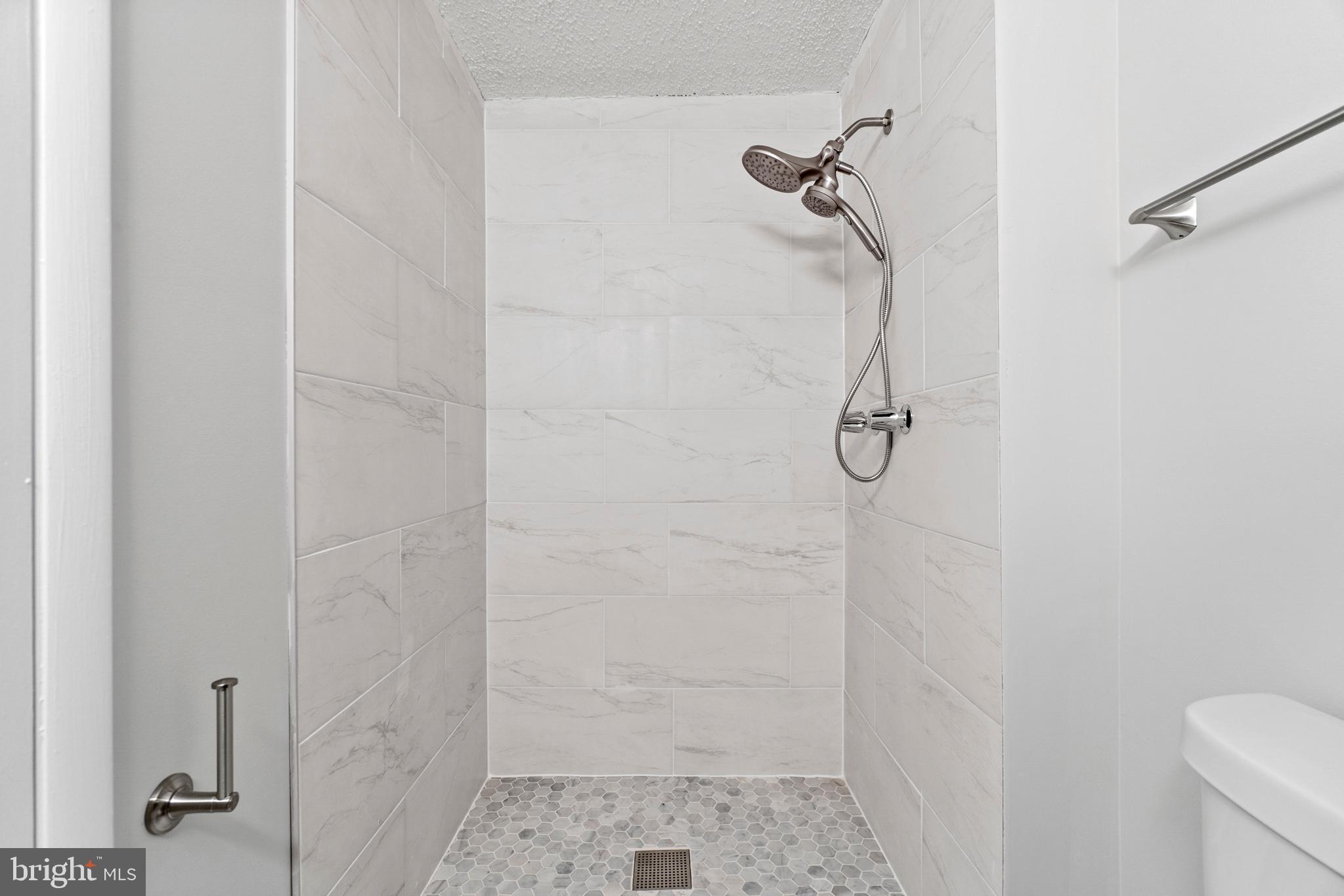 2 Regis Circle Sterling, VA 20164 - Photo 20 of 20 a bathroom with a shower