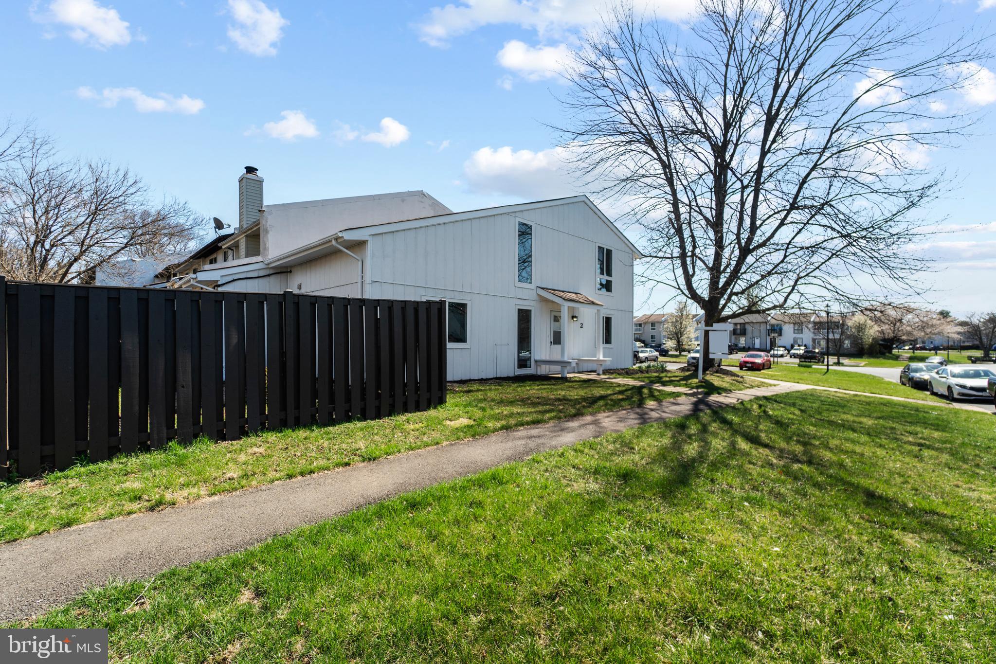2 Regis Circle Sterling, VA 20164 - Photo 9 of 20 a view of a backyard with a tree