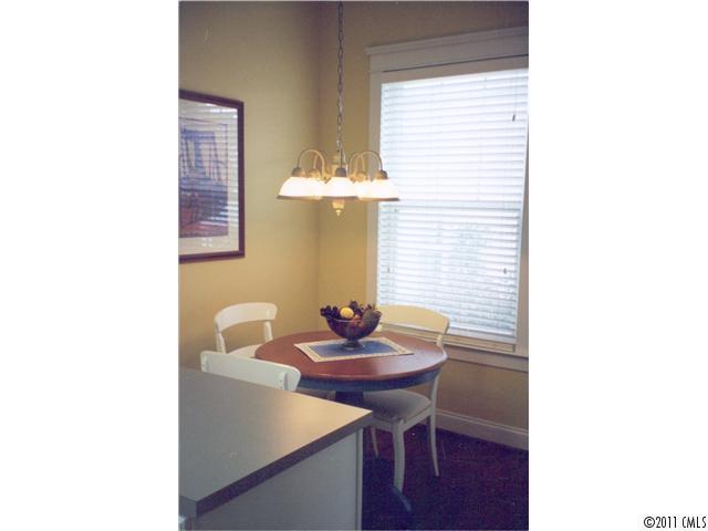 8307 Townley Road Huntersville, NC 28078 - Photo 6 of 16 a view of a dining room with a table and chairs