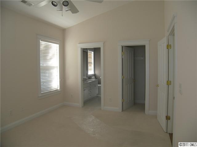 8307 Townley Road Huntersville, NC 28078 - Photo 9 of 16 wooden floor and window in an empty room