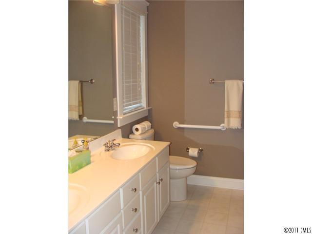 8307 Townley Road Huntersville, NC 28078 - Photo 10 of 16 a bathroom with a sink and a mirror