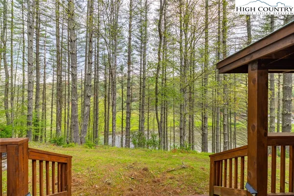 a view of a yard with an outdoor seating