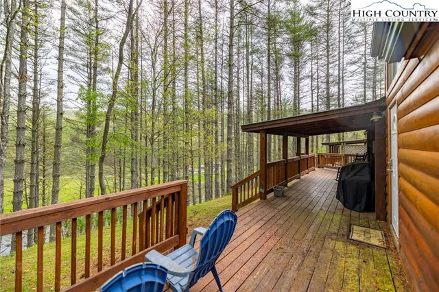 a view of balcony with furniture