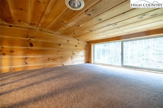 a view of empty room with windows