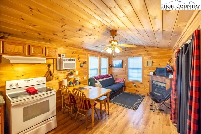 a bedroom with furniture and a fireplace