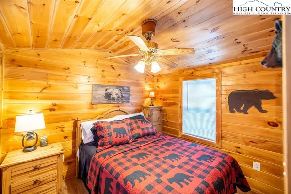 a bedroom with a bed and a walk in closet