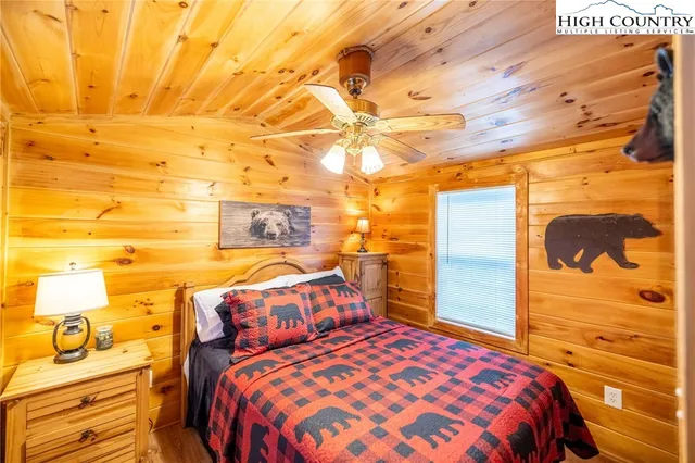 a bedroom with a bed and a walk in closet