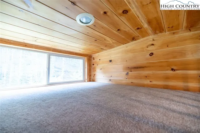 a view of balcony with furniture