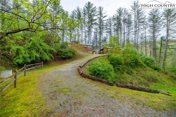 a view of a street with a building in the background
