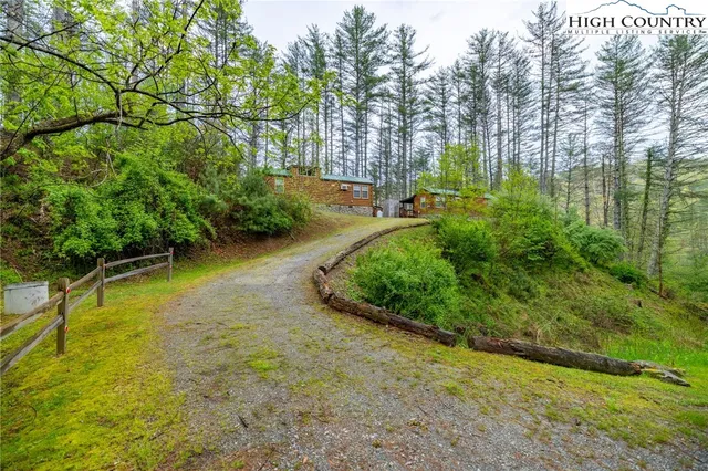 a view of a street with a building in the background