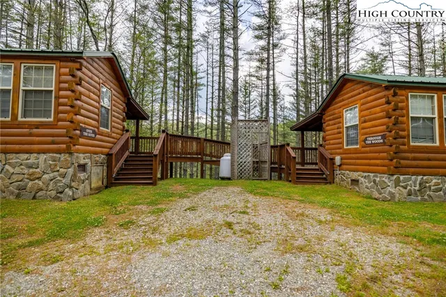 a backyard of a house with barbeque oven