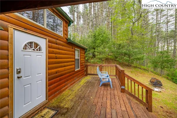 a view of balcony with furniture