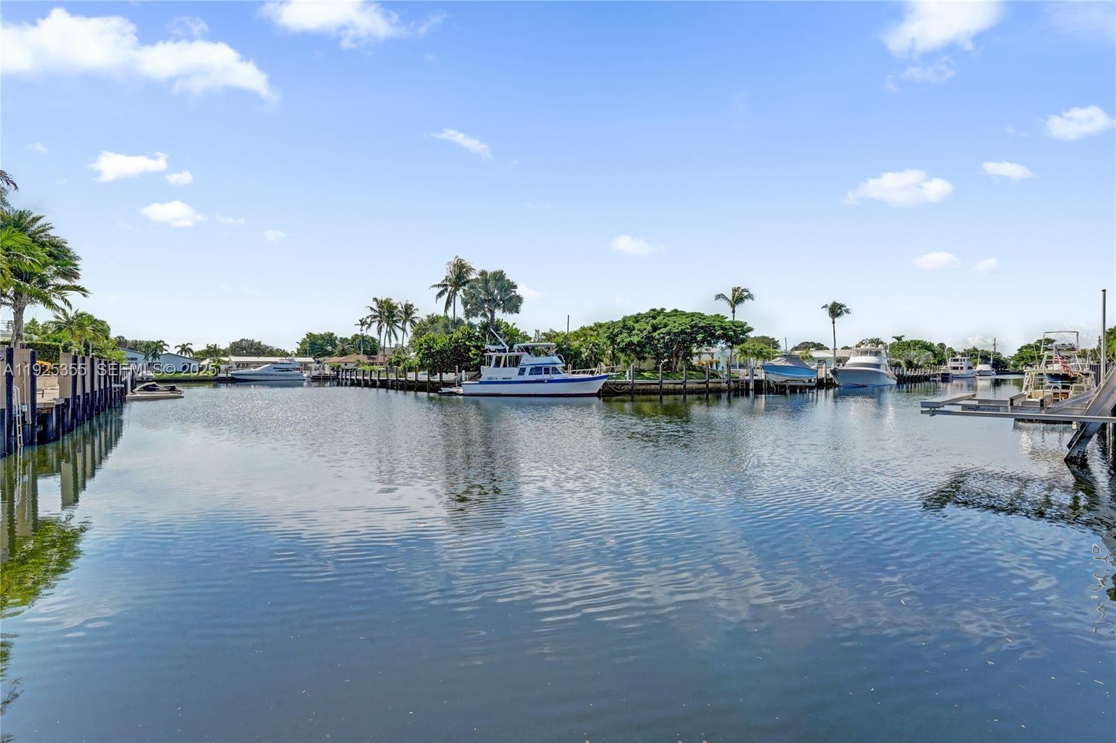 4060 Northeast 26th Avenue Lighthouse Point, FL 33064 - Photo 31 of 34 a view of a lake with houses