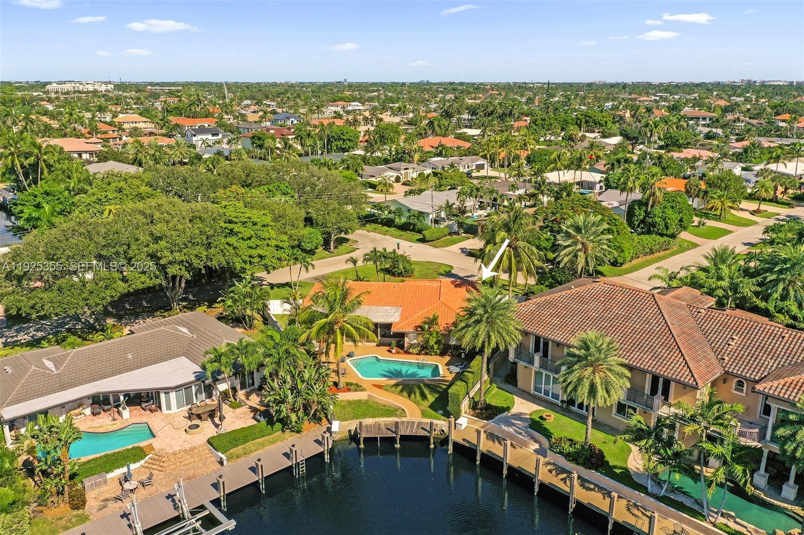4060 Northeast 26th Avenue Lighthouse Point, FL 33064 - Photo 33 of 34 an aerial view of multiple houses with yard