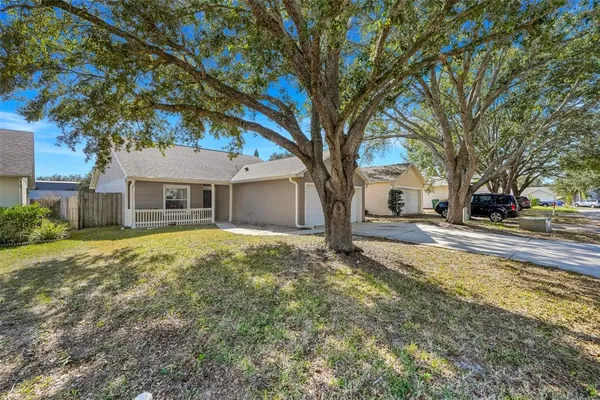 a house with trees in front of it