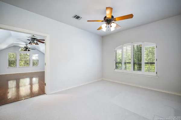 an empty room that has a window