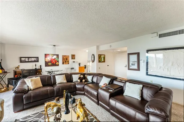 a living room with furniture and a couch
