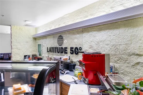 a view of a chairs and tables in the patio