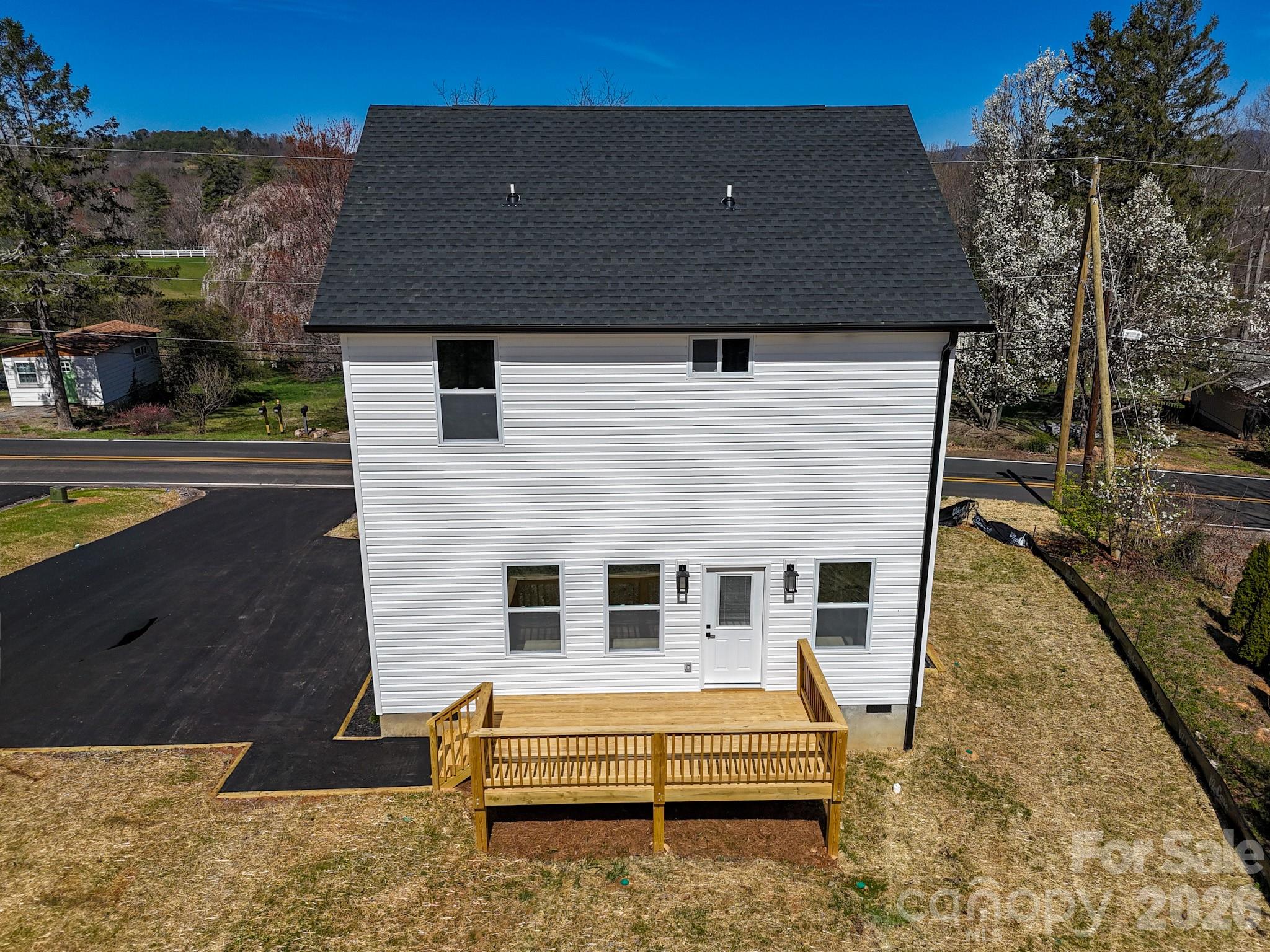 424 Hazel Mill Road Asheville, NC 28806 - Photo 5 of 47 a front view of a house with a yard