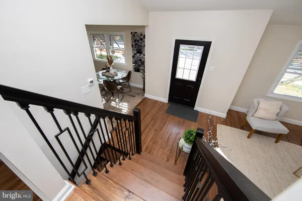 a view of a living room and dining room
