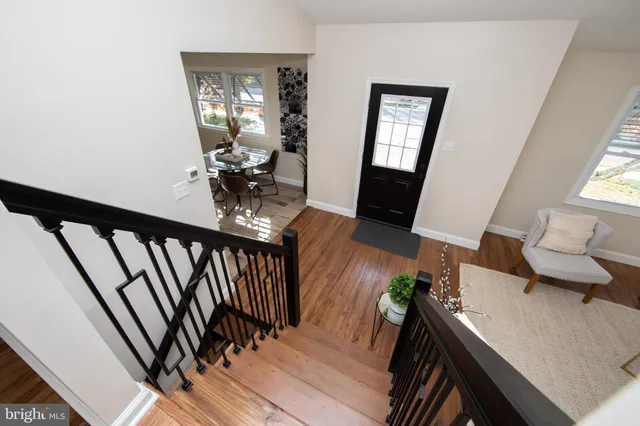 a view of a living room and dining room