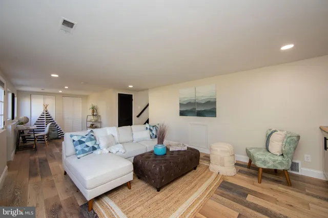 a living room with furniture and a couch