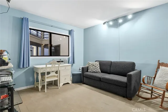 a spacious bathroom with a granite countertop sink toilet and shower