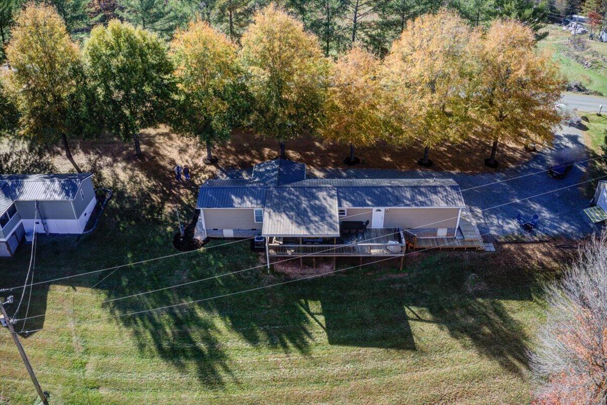 448 Lakeside Road Penhook, VA 24137 - Photo 29 of 51 a backyard of a house with barbeque oven