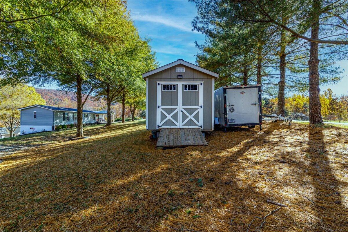 448 Lakeside Road Penhook, VA 24137 - Photo 31 of 51 a front view of a house with a yard