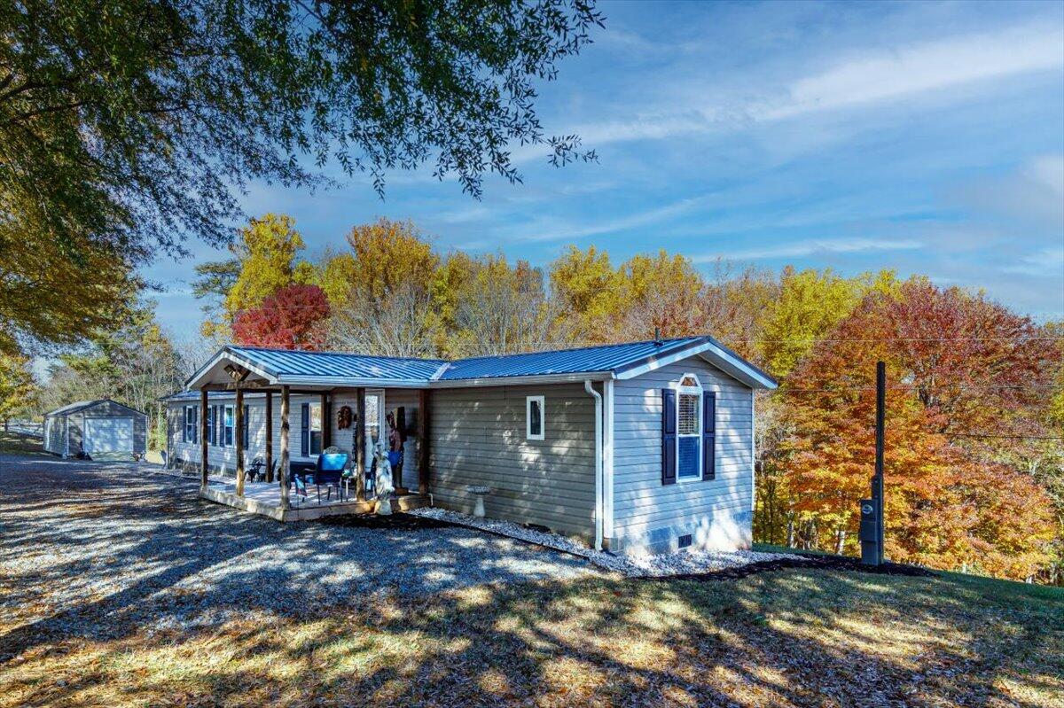 448 Lakeside Road Penhook, VA 24137 - Photo 32 of 51 a view of a house with a yard