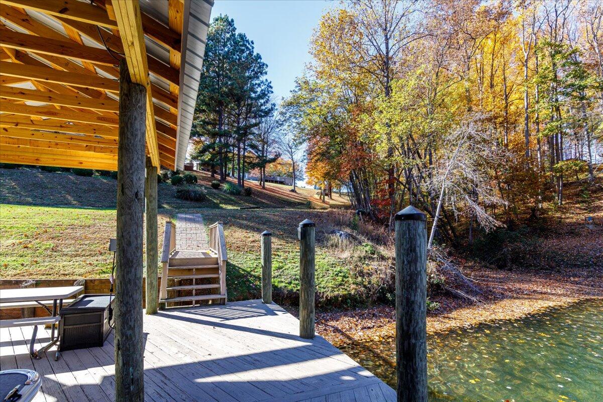 448 Lakeside Road Penhook, VA 24137 - Photo 44 of 51 a view of a wooden deck next to a road