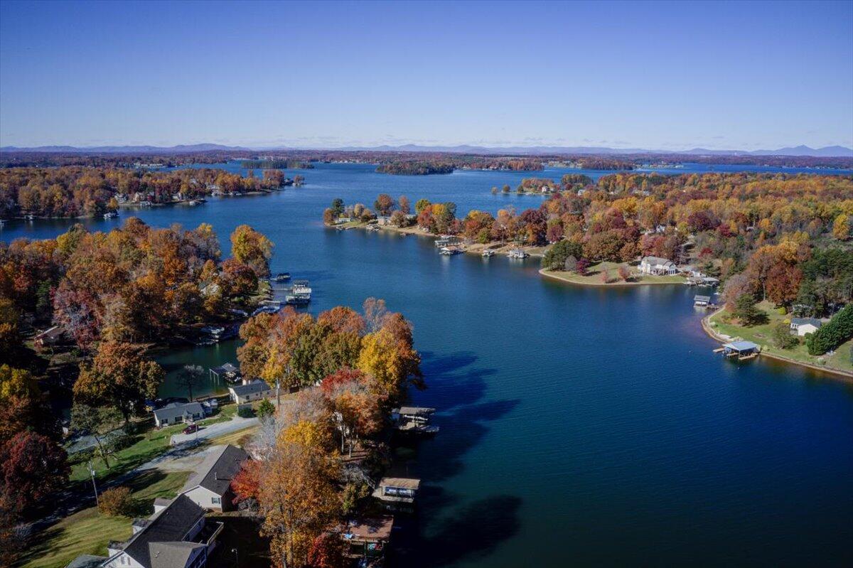 448 Lakeside Road Penhook, VA 24137 - Photo 50 of 51 an aerial view of a city with lots of residential buildings ocean and mountain view in back