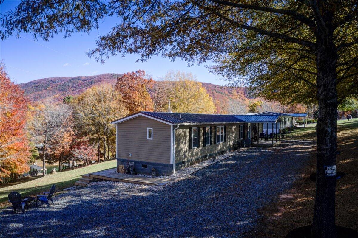 448 Lakeside Road Penhook, VA 24137 - Photo 8 of 51 a view of house with mountain view