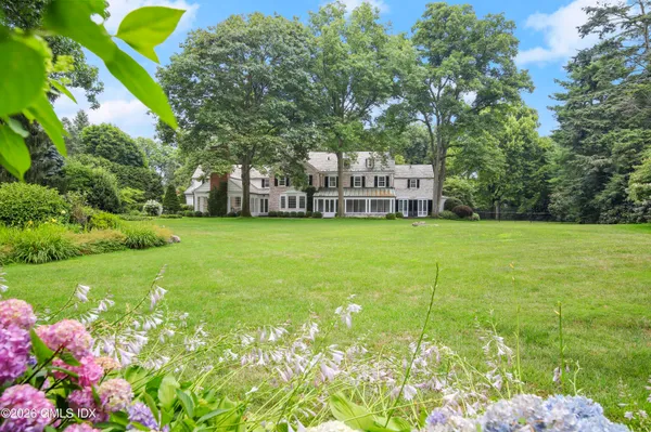 a view of a house with a garden