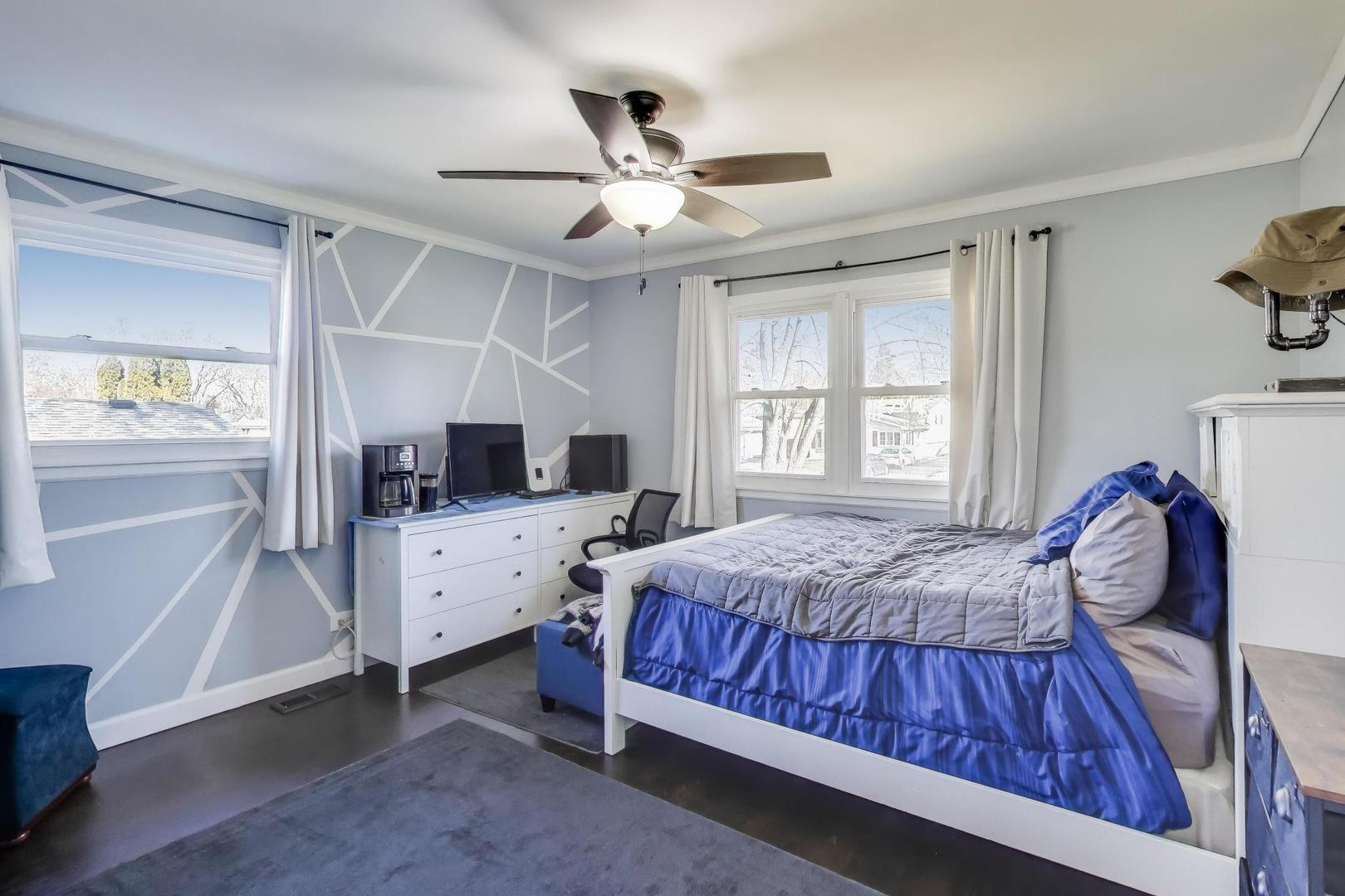 046 North Page Street Winfield, IL 60190 - Photo 11 of 32 a bedroom with a bed and a dresser