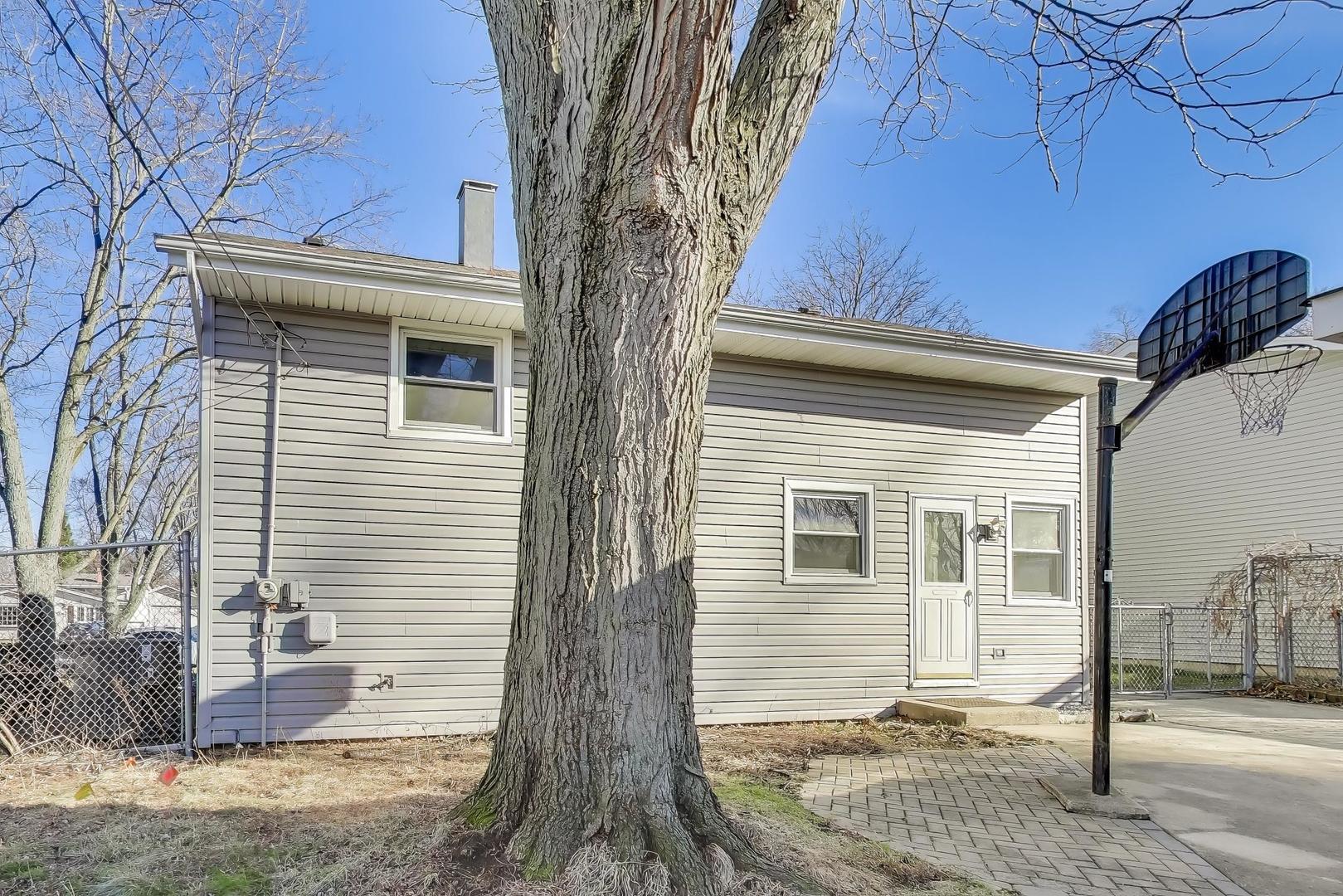 046 North Page Street Winfield, IL 60190 - Photo 25 of 32 a view of a house with a tree