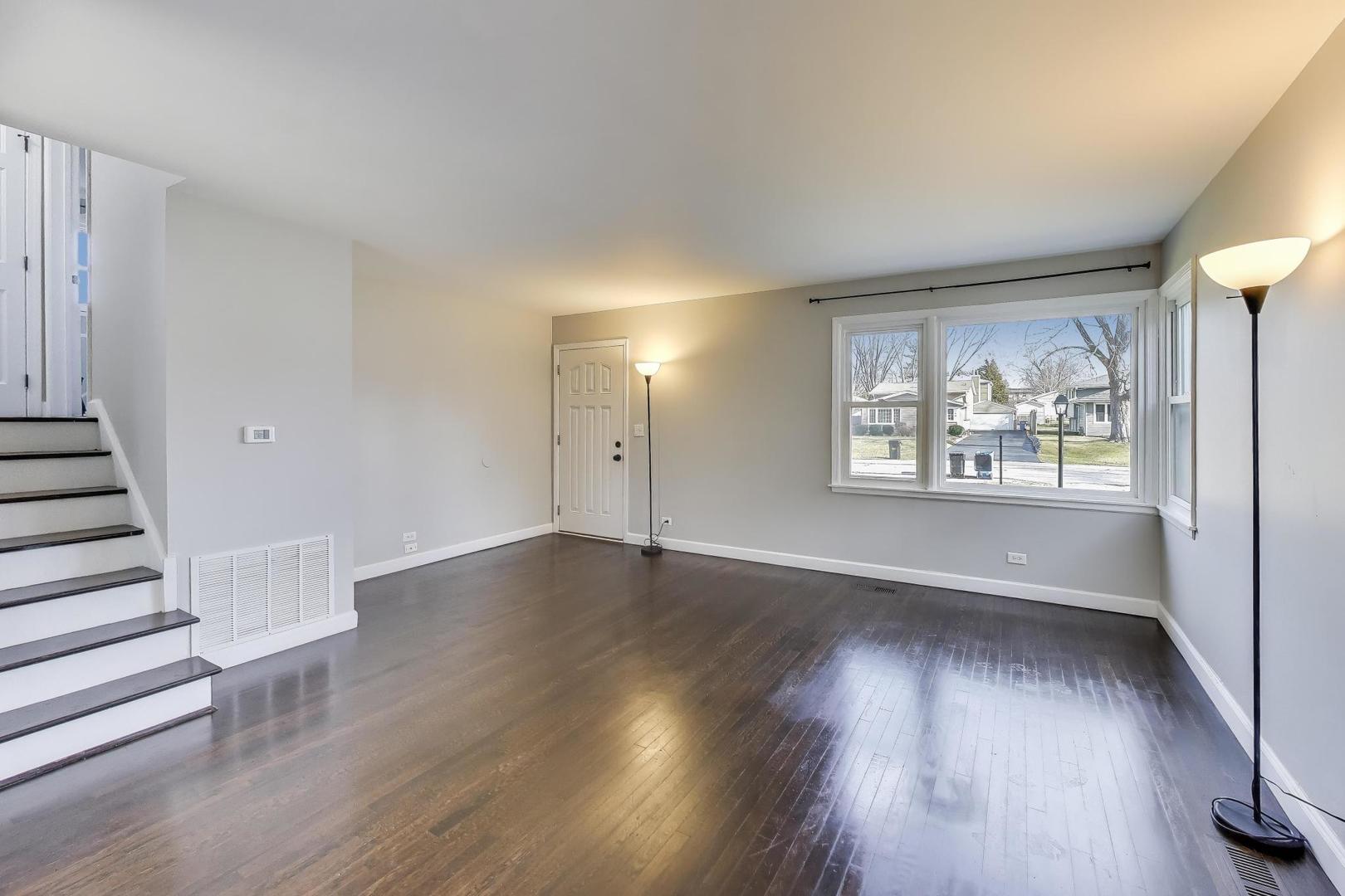 046 North Page Street Winfield, IL 60190 - Photo 5 of 32 wooden floor in an empty room with a window