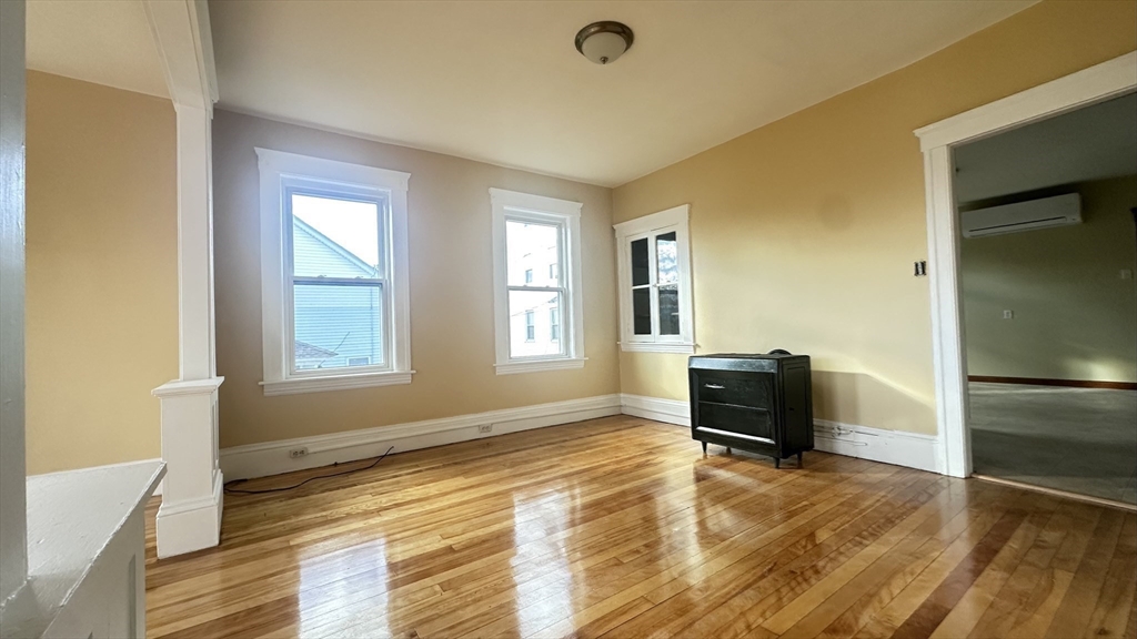 3 Bowker Street Worcester, MA 01604 - Photo 12 of 42 a view of room with wooden floor and furniture