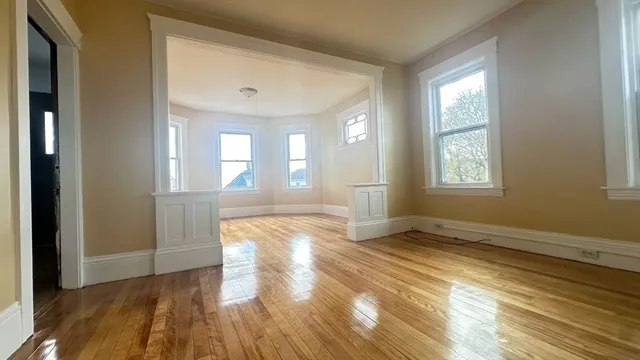 a view of an empty room and window