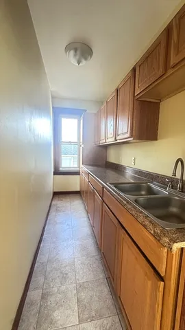 a bathroom with a sink and toilet