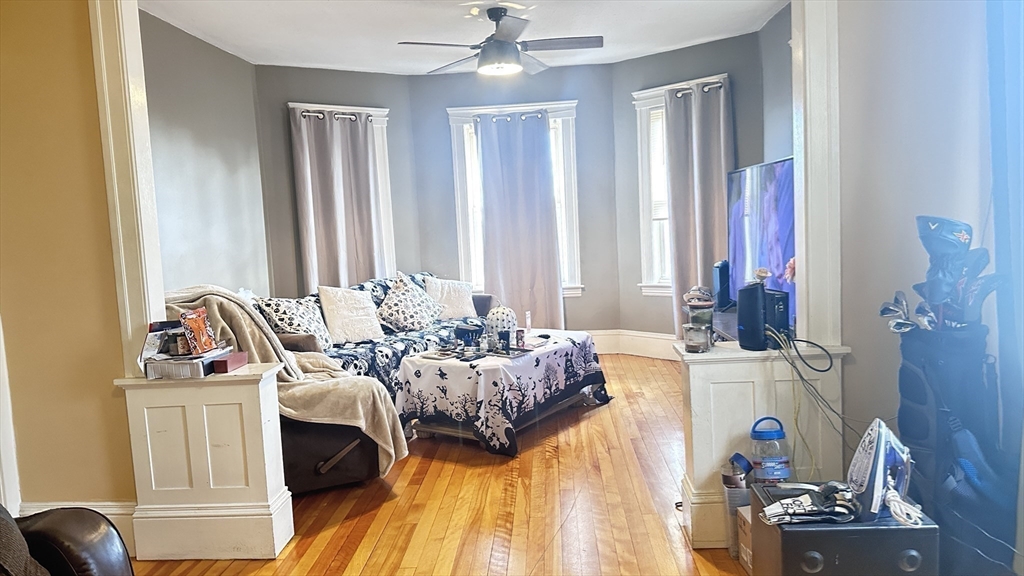 3 Bowker Street Worcester, MA 01604 - Photo 28 of 42 a bed room with a bed and a couch